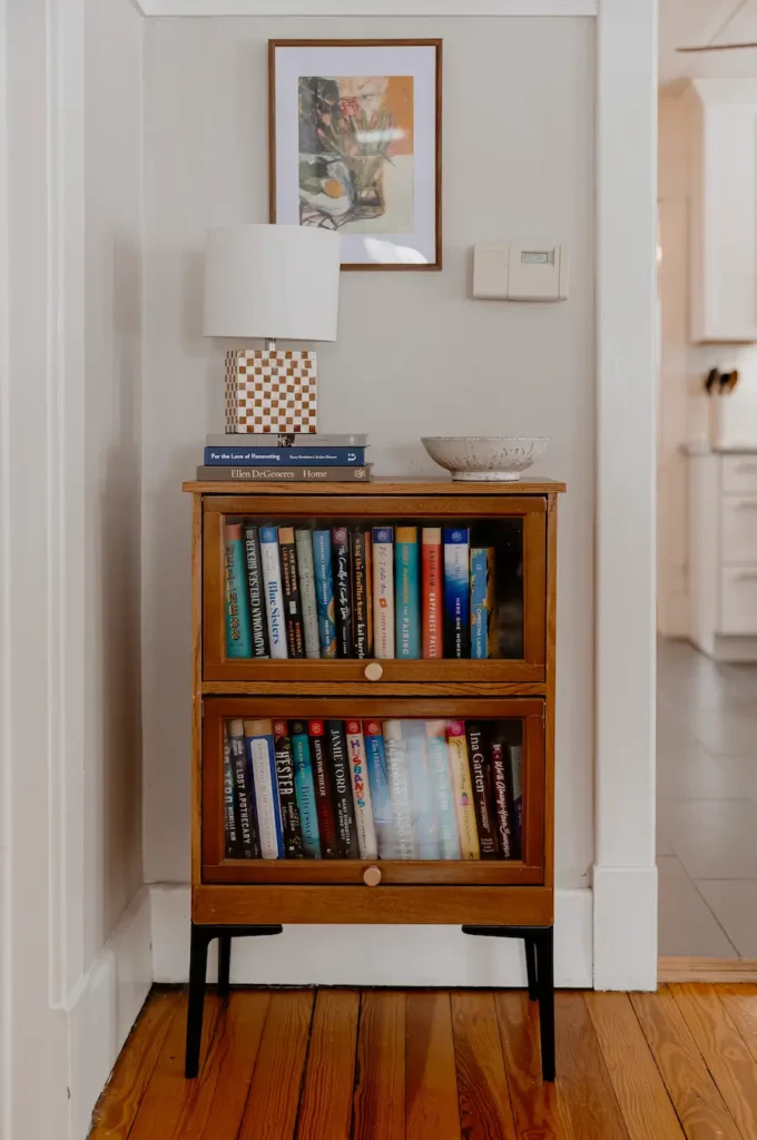 Checker Board lamp on bookcase.