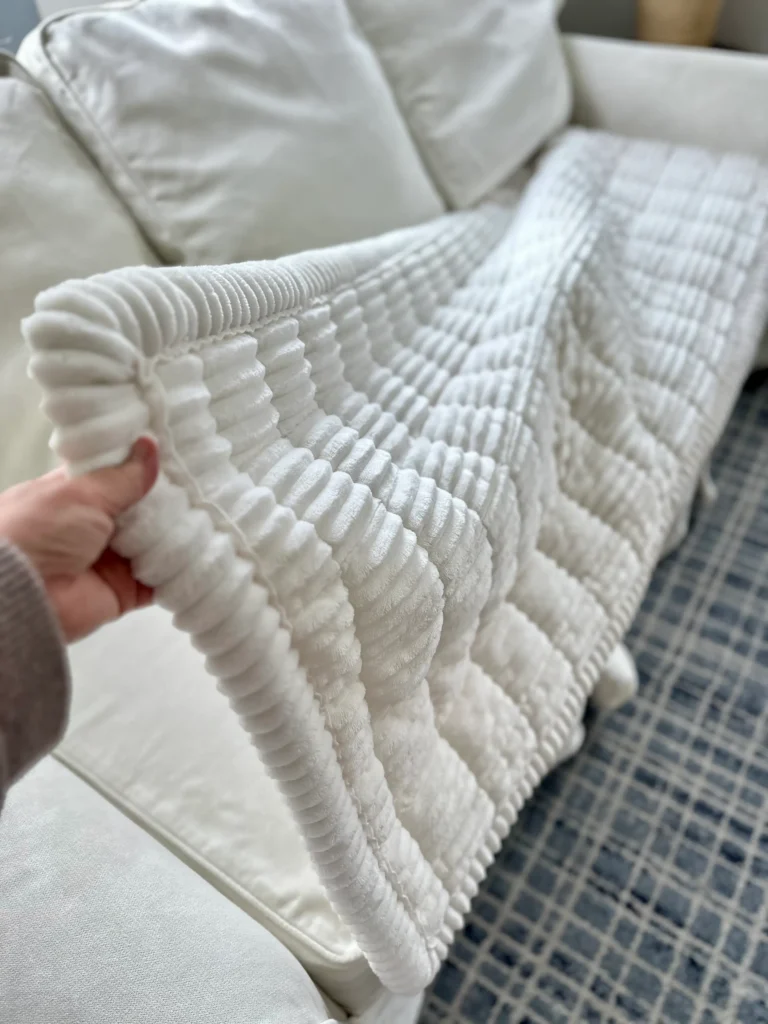 White Sofa Topper on a white sofa.