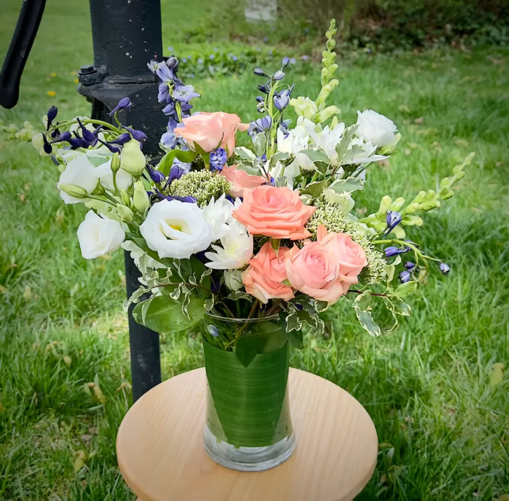 Delphinium Garden a lovely "gathered" style arrangement from 1-800-flowers for Mother's day, birthdays and just because.