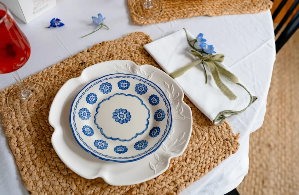 Blue and White dishes on woven placement for Mother's Day Brunch