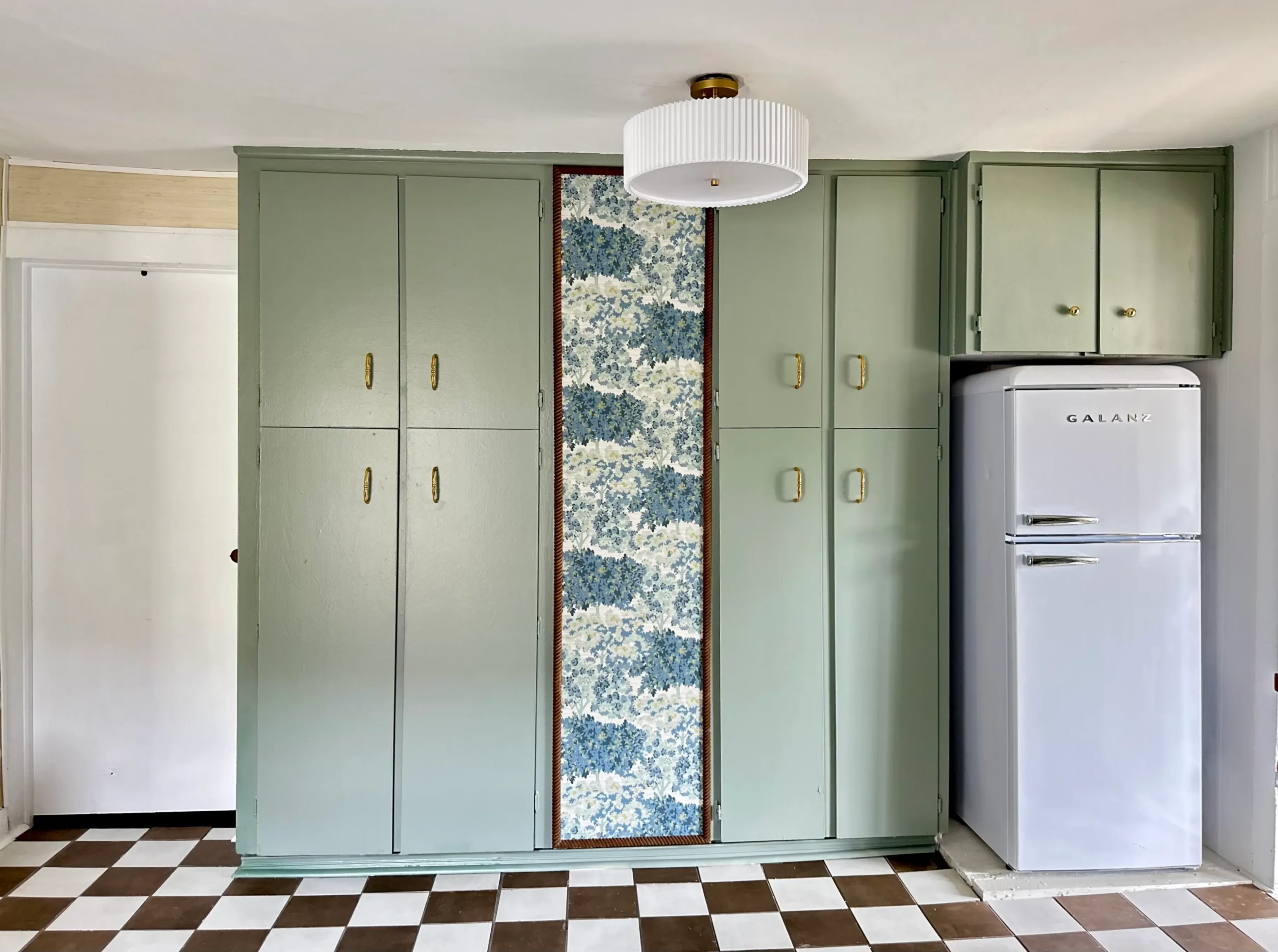 Framed Peel and Stick wallpaper in a kitchen.
