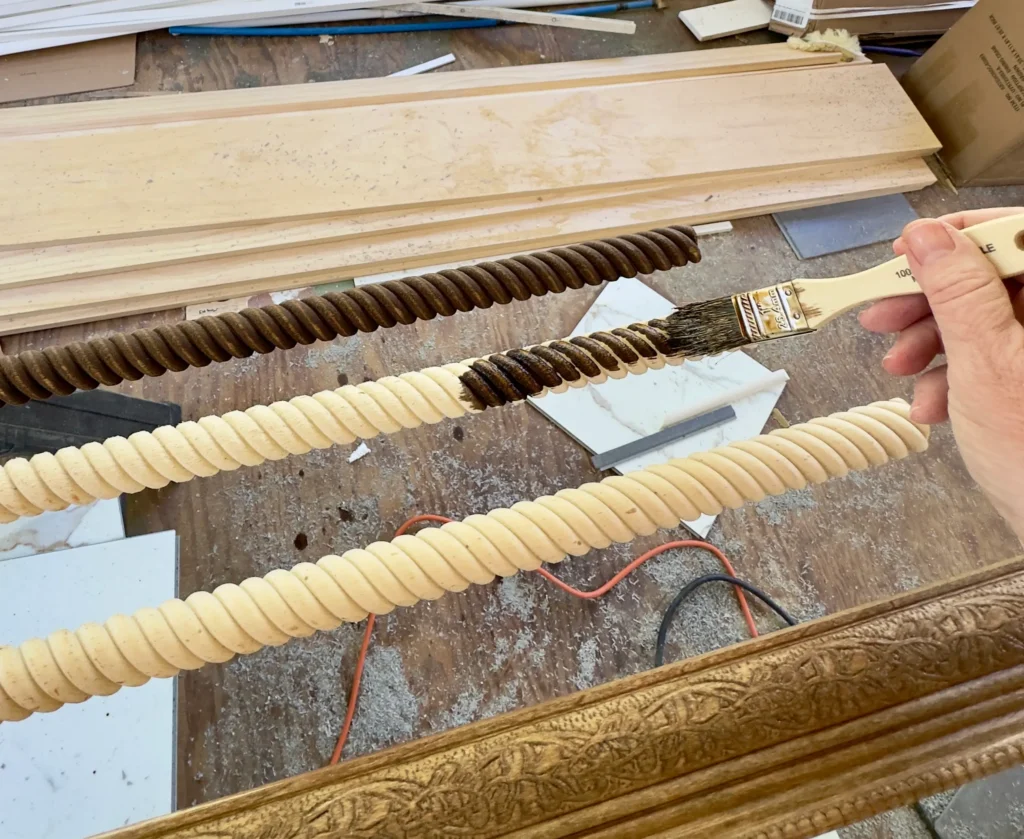 Staining Moulding for a DIY framing wallpaper in a kitchen.